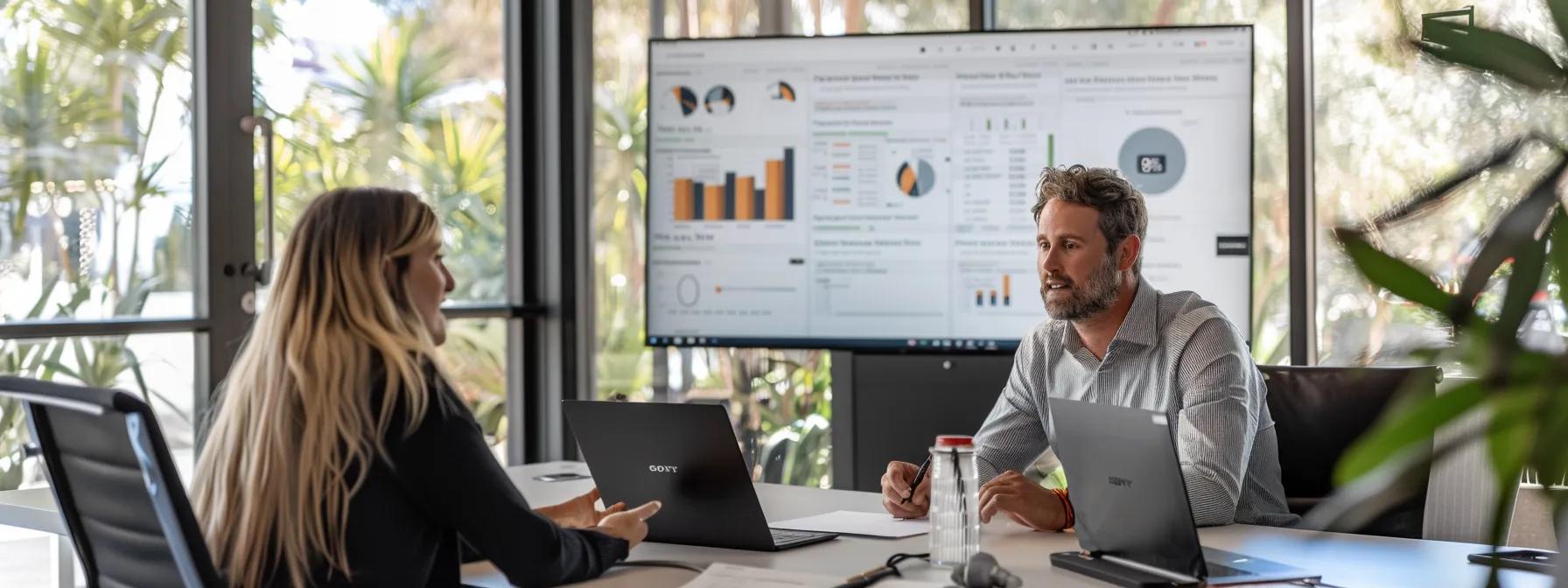 a stylish, modern office space in byron bay, featuring a professional buyers agent discussing property options with a client, with charts and property listings displayed prominently on a sleek conference table, conveying the theme of informed real estate decisions.