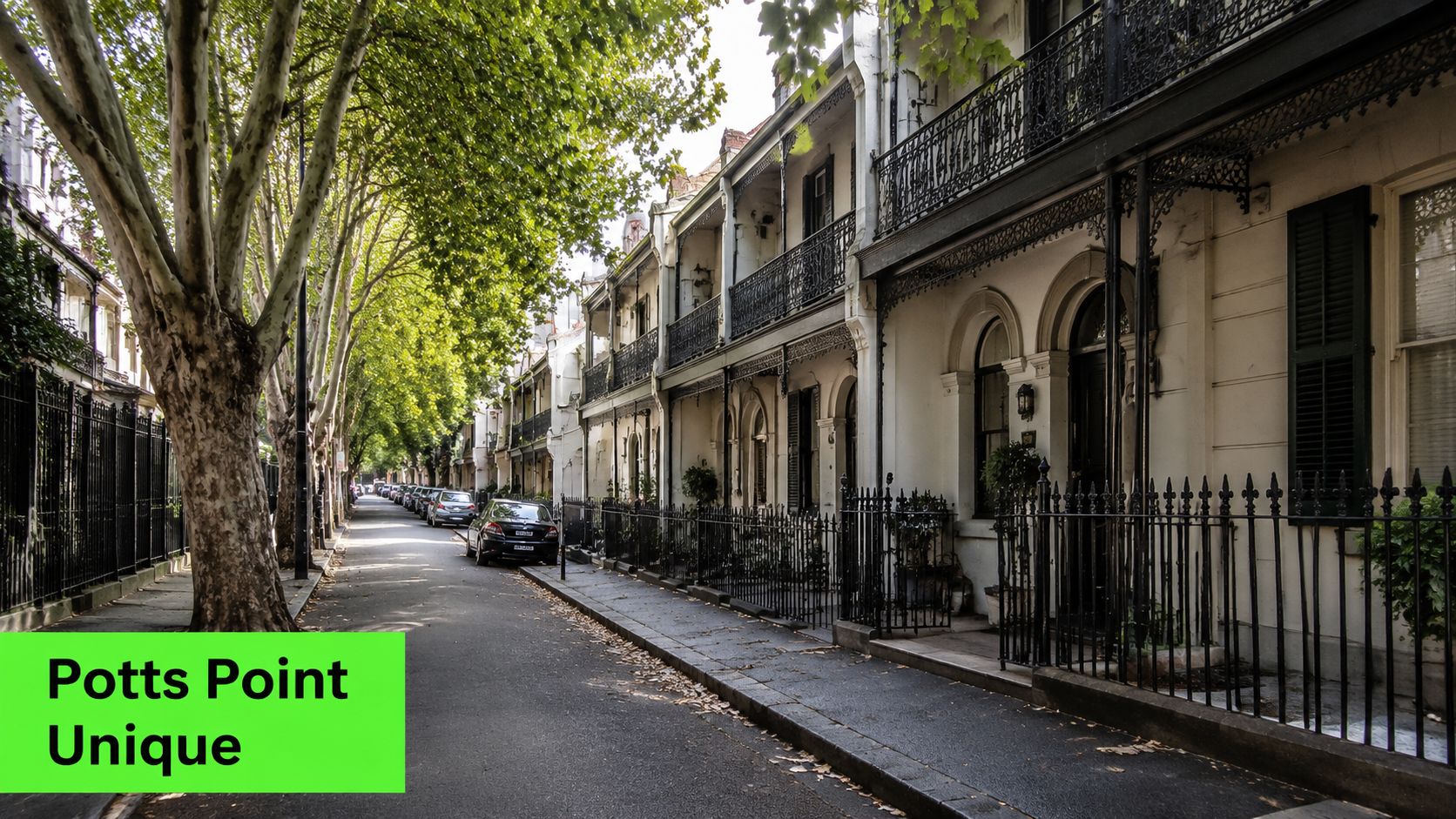 A quiet tree-lined street in Potts Point Sydney featuring classic white terrace houses with iron balconies.